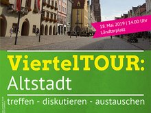 Text: "ViertelTOUR: Altstadt am 18. Mai um 14:00" auf Bild von der Landshuter Altstadt mit Martinsturm