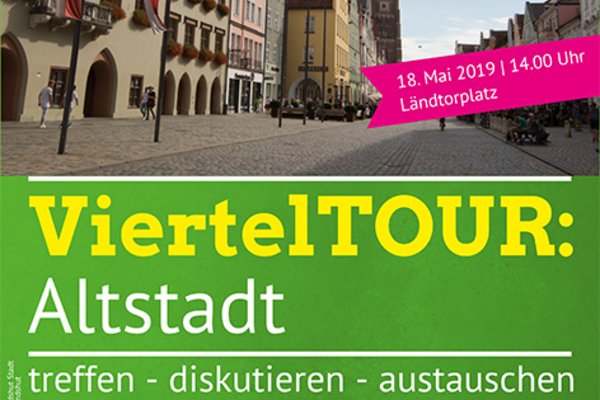 Text: "ViertelTOUR: Altstadt am 18. Mai um 14:00" auf Bild von der Landshuter Altstadt mit Martinsturm